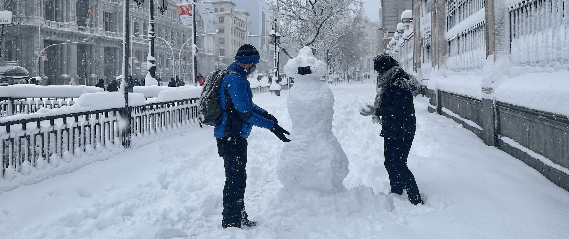 Snowman wearing a face mask in Madrid